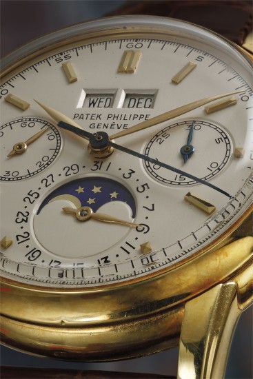 A very fine and rare yellow gold perpetual calendar chronograph wristwatch with moon phases.